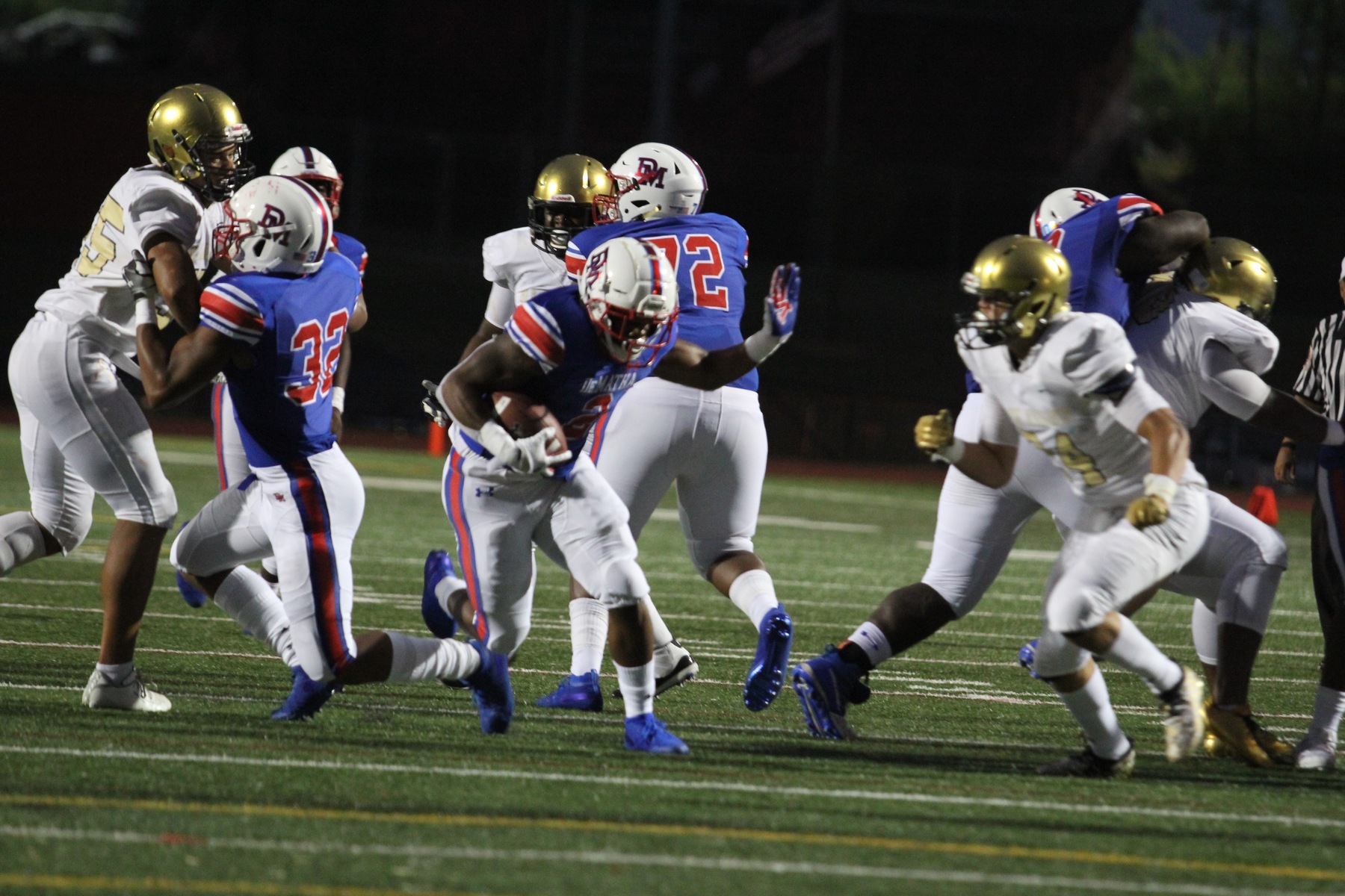 DeMatha Senior, MarShawn Lloyd and the offensive line continue to fuels the Stags offense. (Photo by Ed King)