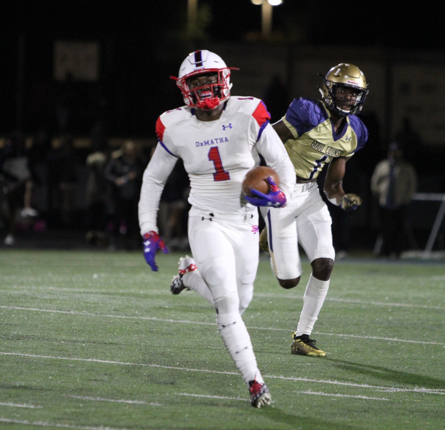DeMatha Senior DeMarcco Hellams (shown) and Senior Nick Cross were all over the field in the Stags win.
